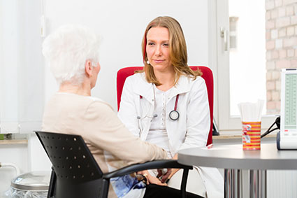 Doctor listening to a patient